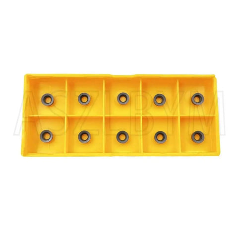 Top view of 11 Piece RCMT060204 MO R3 Round Carbide Inserts Set in yellow storage case for milling and turning metal lathe tools.