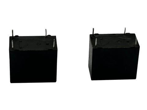 Two black 4-pin high power relays from a Four Pack General Purpose Relay Set 12V DC 10A SPST for DIY projects automotive home automation.