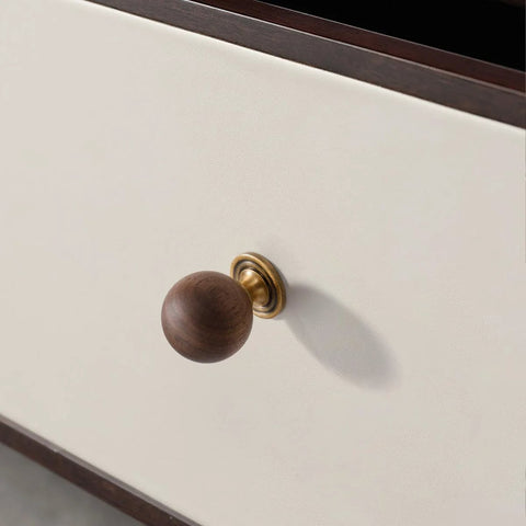 Installed 10 Pack Walnut Wood Sphere Cabinet Pulls With Copper Base 1.18 Inch on white drawer front