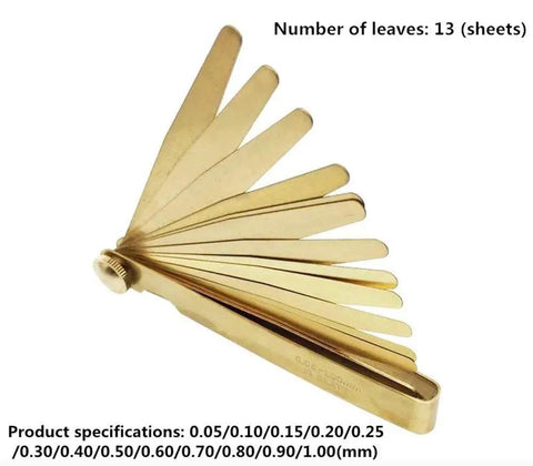 Brass Feeler Gauge Set 0.03 To 1.0 Mm High Precision Clearance Gauge Non Magnetic Copper Feelers with 13 leaves in a spread layout