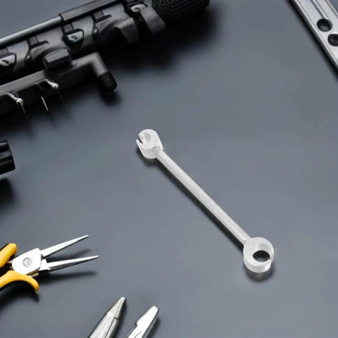 Adjustable Hinge Gap Tool Heavy Duty Wrench For Precision Door Hinge Alignment And Repair Fits Fireproof Doors And Multiple Hinge Types Portable DIY Friendly Tool For Home And Commercial Use on black surface surrounded by tools.
