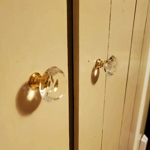 8 Pack Crystal Glass Cabinet Knobs with Gold Base installed on wooden cabinet doors