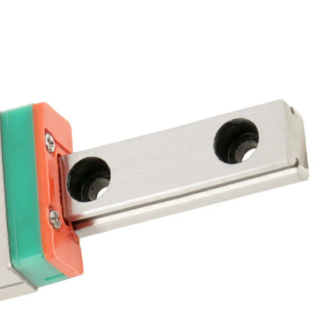 Close-up of Two Piece LML7B Miniature Linear Rail Guide Set with 7mm width slide block, steel material for CNC machines and precision systems.