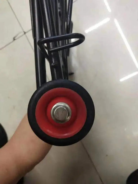 Close-up of wheel from Foldable Lightweight Two Wheel Shopping Cart Dolly With Easy Open Design Portable Hand Truck Utility Trolley.