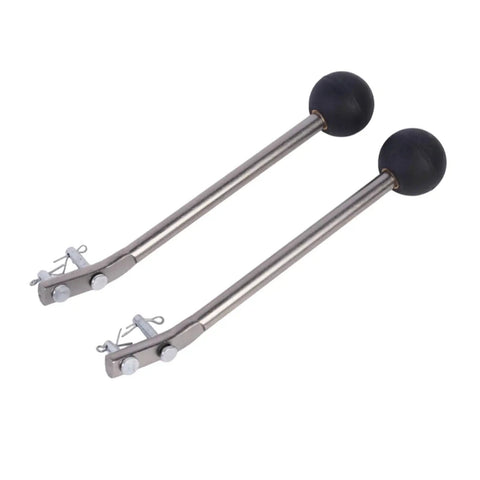 Pair of metal rods with black end balls, close-up view.