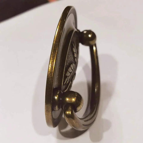 Antique Brass Bail Drawer Pull Set Four Pack Oval Drop Swing Handles For Cabinets, Zinc Alloy, side view showing oval swing handle.