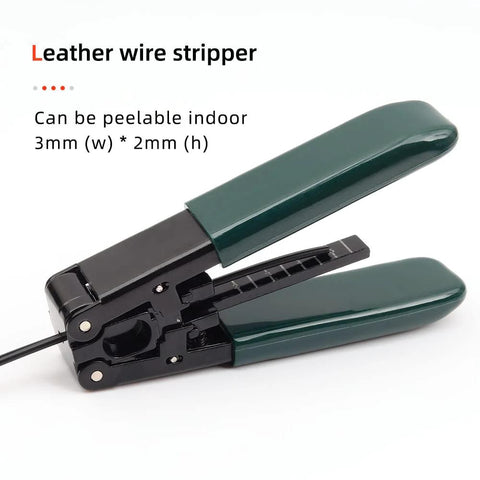Fiber optic stripper tool with green handles and black metal jaw.