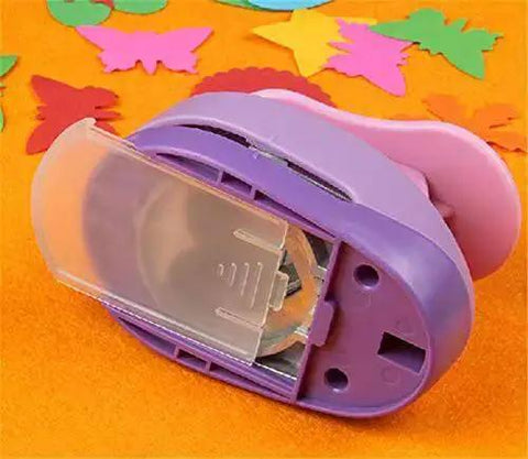 2 Inch Oval Paper Punch for Crafting and Scrapbooking, purple plastic with clean edges on colored paper cutouts