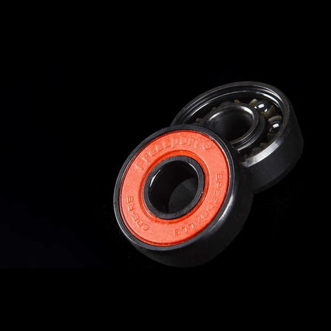 608RS red-sealed bearing pair with black outer race for inline skates, skateboards, or scooters.