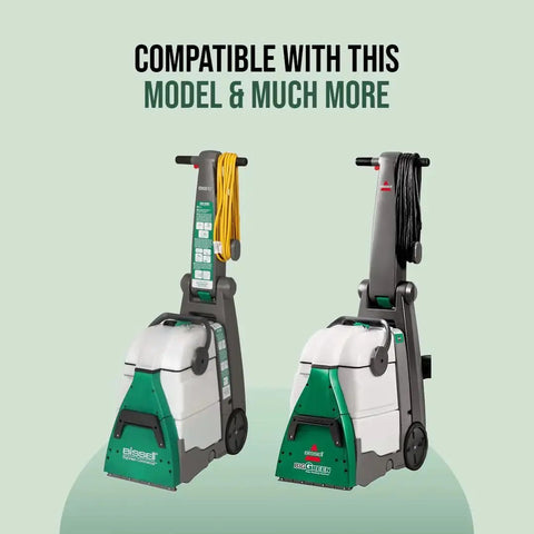 Two Bissell BigGreen commercial carpet cleaners with yellow and black hoses, front view.