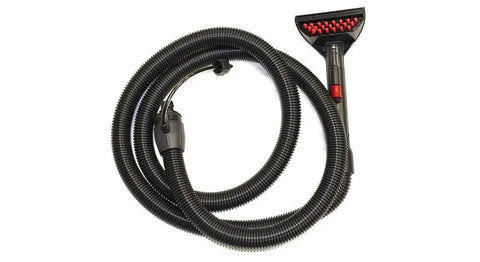 Front view of Bissell commercial hose and upholstery tool with black ribbed hose and wide upholstery nozzle.
