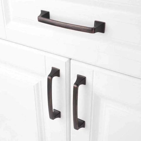 Oil Rubbed Bronze 5 Inch Cabinet Pulls Pack Of 10 Solid Metal Contemporary Big Square Arch Handles installed on white cabinets