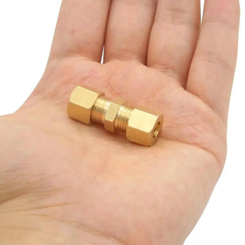 Brass Compression Fittings 3 Pack For One Quarter Inch Tube OD To One Quarter Inch Tube OD Ice Maker Water Line Connectors in hand