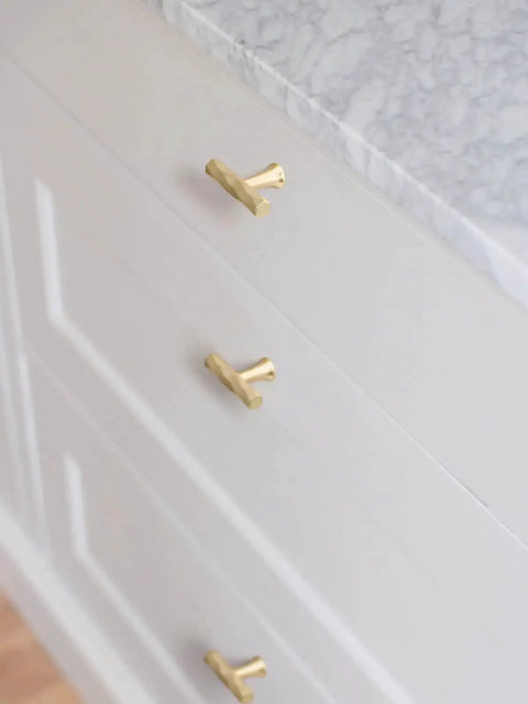 Brushed Gold Cabinet Knobs 10 Pack Hammered Brass Handles For Cabinets Drawers And Cupboards on kitchen drawers with marble countertop.
