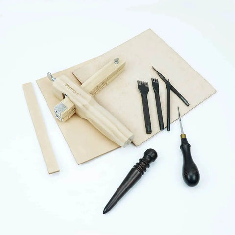 Adjustable Leather Strap Cutter With 3 Blades For DIY Leatherwork, Wooden Construction That Will Not Bend, Cuts Any Weight Of Leather And Up To Three Point Five Millimeters Thick, Includes One Cutter And Three Blades By Bestnule, shown with tools and leather pieces.