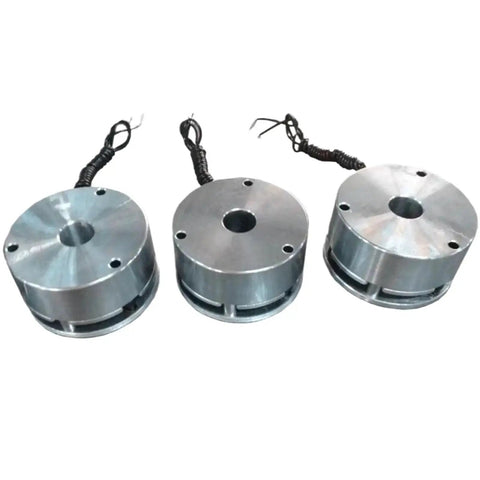 Three aluminum DC motor electromagnetic brake modules with attached wiring.