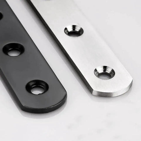 Close-up of Stainless Steel Flat Mending Plates Set Of 4 For Wood And Metal Repair, 12 Inch Length, Black and silver finish with holes.