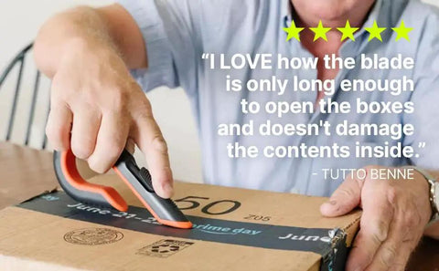 Person using 3 Position Box Cutter With Ceramic Zirconia Blade And Locking Blade on a cardboard box