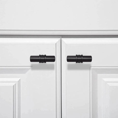 2 Pack Matte Black Cabinet Pulls T Bar Knobs For Kitchen Cupboards And Bathroom Cabinets installed on white doors