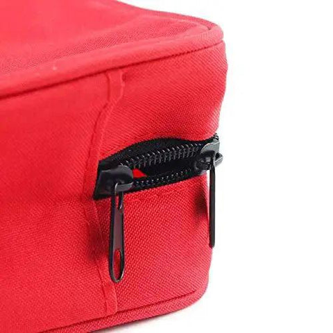 Close-up of zipper on compact red first aid bag for emergency medical supplies, featuring organized interior, 25x18x8 cm portable kit.