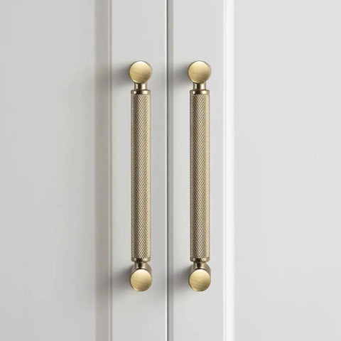 6 Pack 5 Inch Center To Center Knurled Cabinet Pulls In Champagne Bronze With Circular End Caps For Modern Furniture on white cabinets