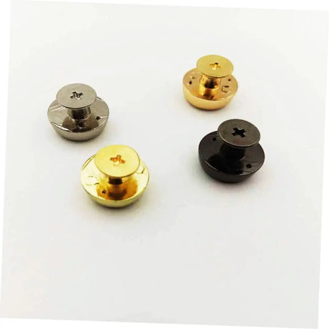Assorted metal rivets from Leathercraft Bag Rivets Set For Purses Belts And Handbags DIY Decoration in silver, gold, and black.