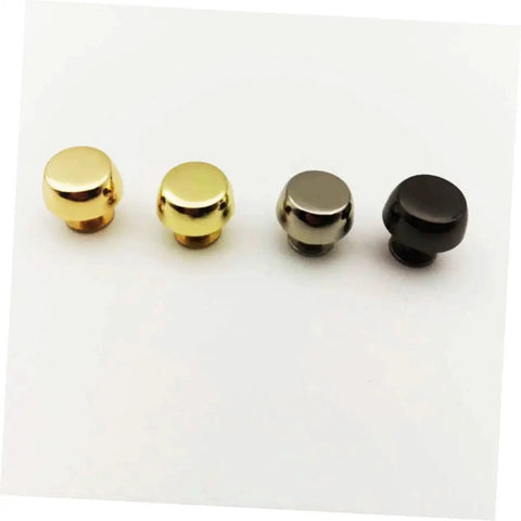 Leathercraft Bag Rivets Set For Purses Belts And Handbags DIY Decoration showing four metal rivets in various colors.