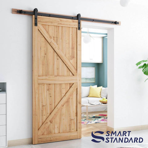 6.6FT Barn Door Hardware Kit with I Shape hanger installed on wooden door, heavy duty carbon steel sliding track