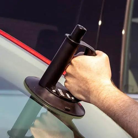 Two Piece Beefy Angle Grip 6 Inch Vacuum Suction Cup used for auto glass handling with angled ergonomic handle in action