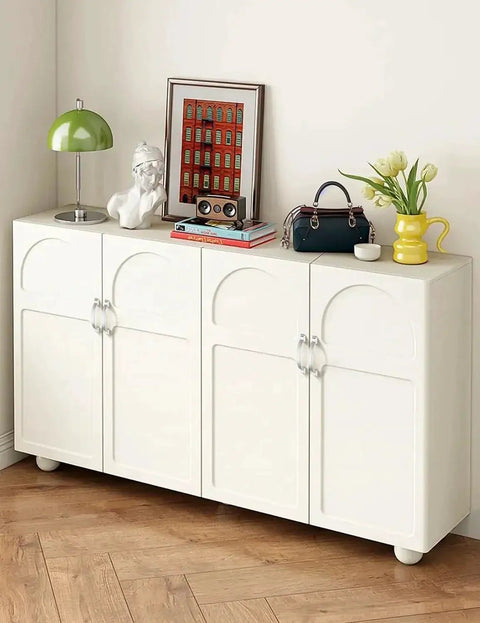 White cabinet with decorative items, not featuring product 10 Pack 4 Inch Satin Nickel Cabinet Pulls Zinc Alloy Drawer Handles For Kitchen Cabinets.