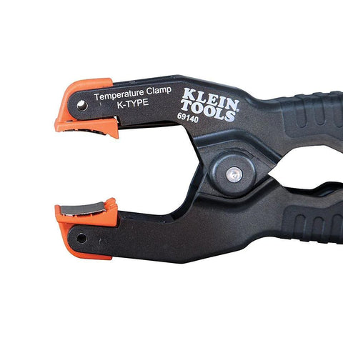 Klein Tools 69140 K-Type temperature clamp for HVAC pipes, black body with orange jaws.