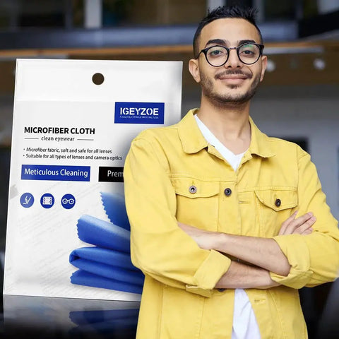 Man posing with pack of 20 Ultra Soft Microfiber Glasses Cleaning Cloths For Eyeglasses And Devices, blue cloths visible