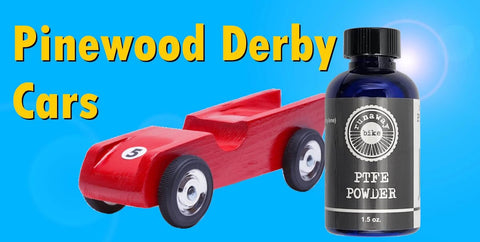 100 Percent PTFE Dry Lubricant Ultra Fine Powder For Metal And Plastic bottle next to red pinewood derby car on blue background.