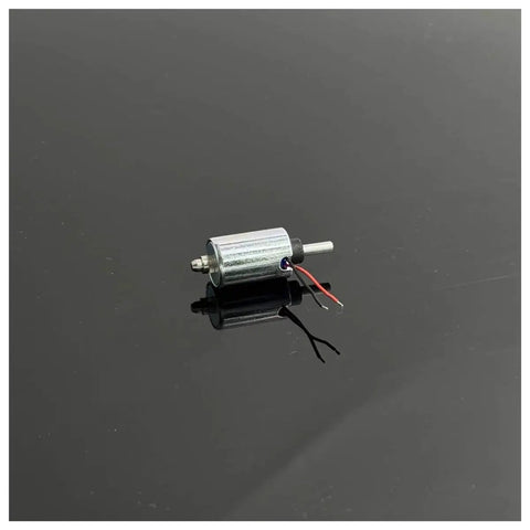 Mini Round 10mm Solenoid Electromagnet With 7.4V 9V 12V DC, Suction Push Pull Type, 5.5mm Plunger Stroke on black surface