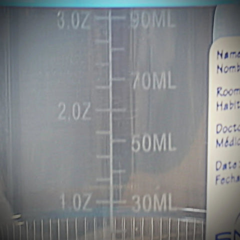 Clear plastic specimen cup with blue screw-on cap and 3 oz / 90 mL measurement markings.