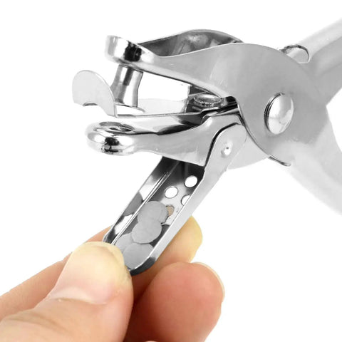 Close-up of metal single hole punch with confetti storage, part of 24 Pack One Quarter Inch Single Hole Puncher Set With 5 Sheet Capacity