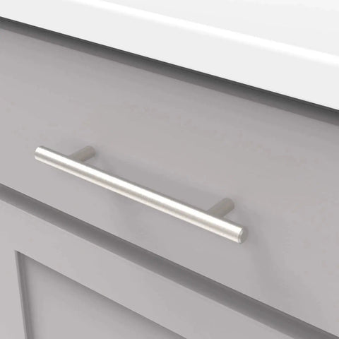 Bar Pulls Collection Five And One Sixteenth Inch Center To Center Stainless Steel Cabinet Pulls with solid metal core installed on drawer