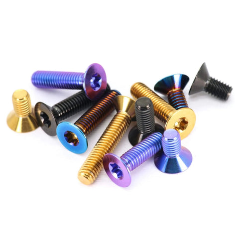 Assorted titanium alloy screws showing colors and styles, unrelated to Pro Grade Titanium Alloy Countersunk Screws And Flat Head Bolts Set Ti6Al4V Black Finish M4 M5 M6 M8 12mm Length 4 Pack Built For Heavy Duty Use CNC Finished.