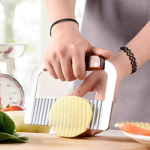 Crinkle Slicer Set Of 2 For Wavy Fries And Veggies With Stainless Steel Blade And Wooden Handle From Guardians in use slicing potato