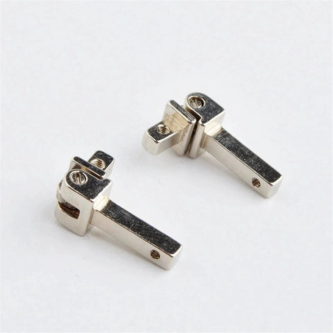 Two silver alloy eyewear hinges for glasses and sunglasses, part of the 10 Sets Replacement Eyewear Hinges For Glasses And Sunglasses With Spring Hinges Alloy Silver Tone Easy Install Non Fading Ergonomic Design Universal Fit Repair Kit For Wide Compatibility And Durable Plastic Frame Eyewear Parts on white background, showcasing easy installation and durable design.