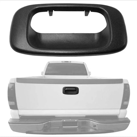 Black Tailgate Handle Trim Bezel Cover for Silverado Sierra 1999-2007, OEM-style, shown above truck tailgate.
