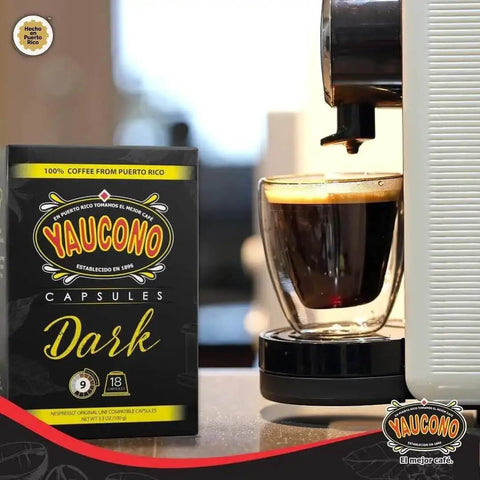 Your Go To Dark Roast Espresso Capsules 18 Count Pack Compatible With Nespresso Machines 100 Percent Puerto Rican Coffee Resealable Box Smooth Balanced Full Bodied Bold Flavor next to espresso machine.