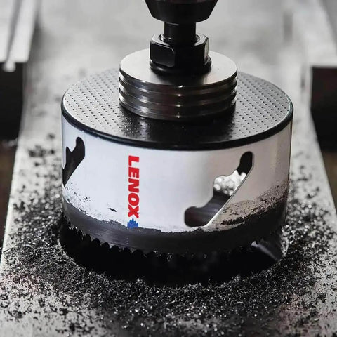 Bi Metal Speed Slot Hole Saw Two And Three Quarter Inch for metal and wood cutting shown in action on a metal surface