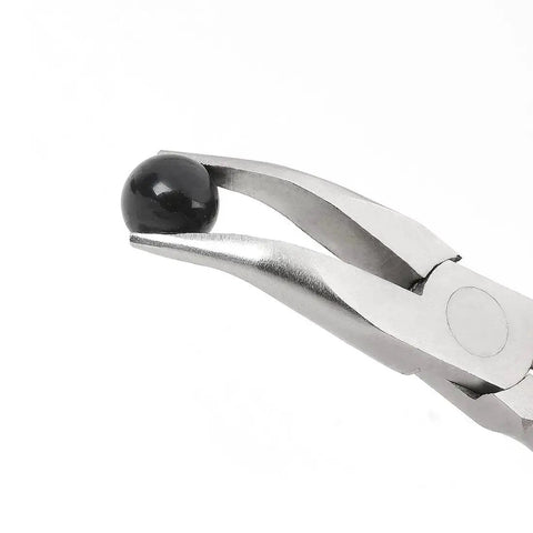 Close-up of 7 Piece Jewelry Pliers Set for Beading and Wire Wrapping, holding a bead with needle nose pliers for crafting.