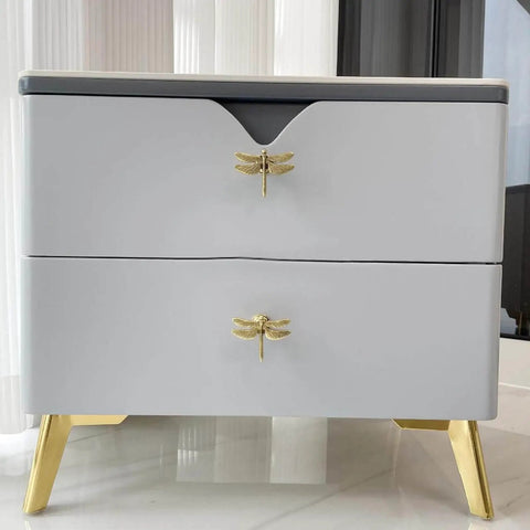 Dragonfly Drawer Knobs Set 6 Pieces in Ancient Gold on white dresser, zinc alloy, modern home decor, wing detail visible.