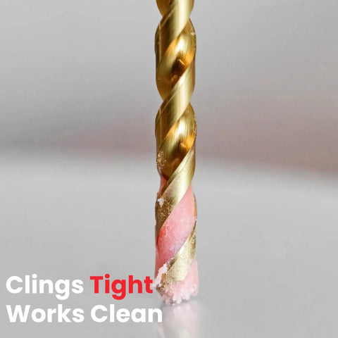 Drill bit coated with pink Beeswax Based Cutting Paste For Metal Drilling And Tapping, 2.5 Oz Tube, Made In USA, Lubri-Cut.