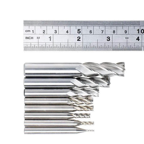 End Mill Set Of 8 High Speed Steel HSS 4 Flute Straight Cutters For Milling And Slotting In Metalworking And Woodworking displayed with ruler