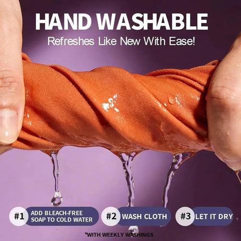 Hand washing an orange microfiber lens cleaning cloth from the Eight Pack Microfiber Lens Cleaning Cloths For Glasses Screens Cameras VR AR.