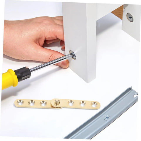 Installation process of Copper Pivot Hidden Door Hinges 4 Piece Set For Cabinets And Bookcases with a screwdriver