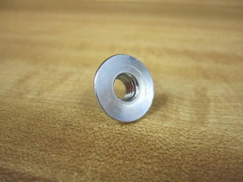 Hex Nut Fastener 5/16-18 Coarse Thread Pack of 6, PN 3842523561, shown in close-up on wooden surface